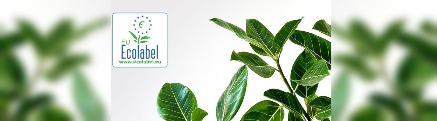 Ecolabeli logo toataimede taustal
